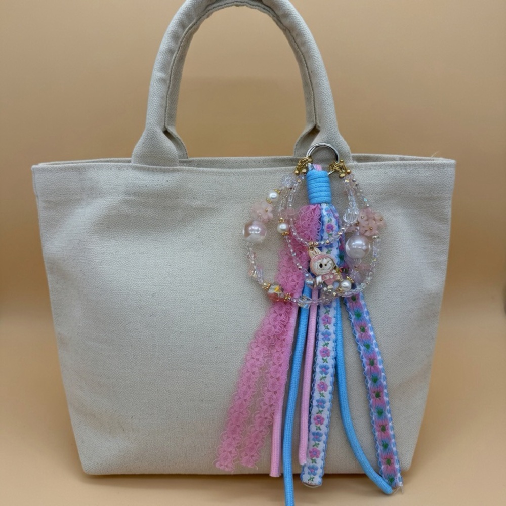 Cute Bag charm with beads and lace rope detail